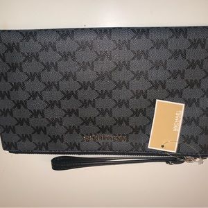 Michael Akira jet set wristlet.  Never used.